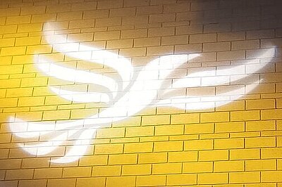 Local News Image of Lib Dem logo projected onto a wall