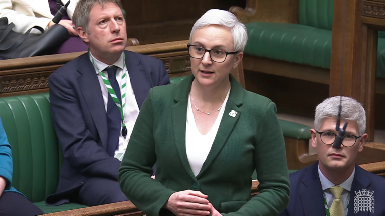 Alex speaking in Parliament.